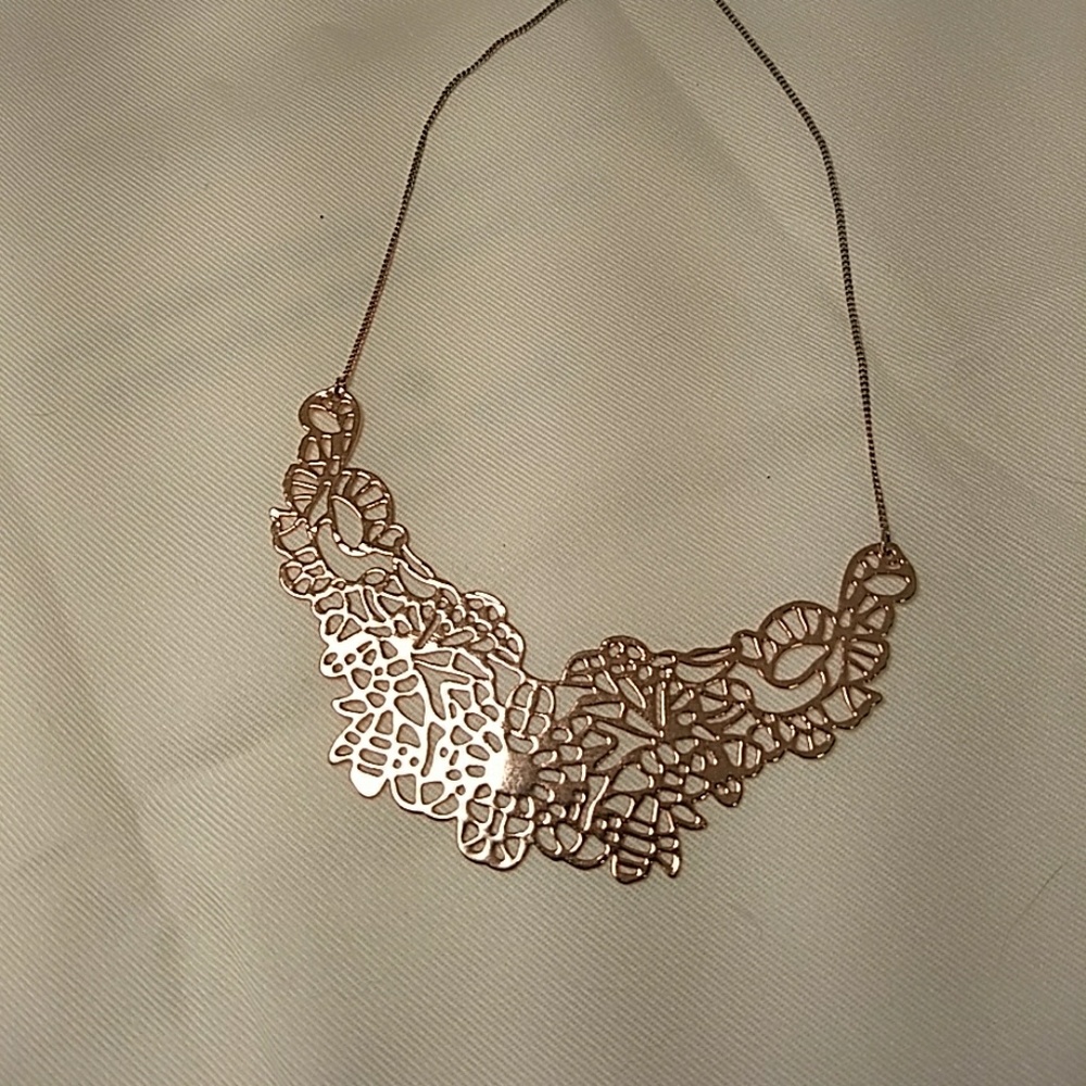 Rose gold colored necklace